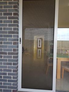SECURITY SCREEN DOOR