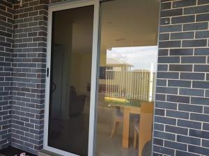 SECURITY SCREEN DOOR