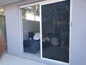 SECURITY SCREEN DOOR