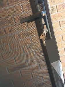 SECURITY SCREEN DOOR