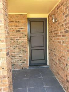 SECURITY SCREEN DOOR